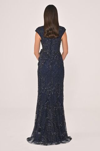 Dekolteli Beli Çiçek Aksesuarlı Payet Uzun Elbise Lacivert - 40